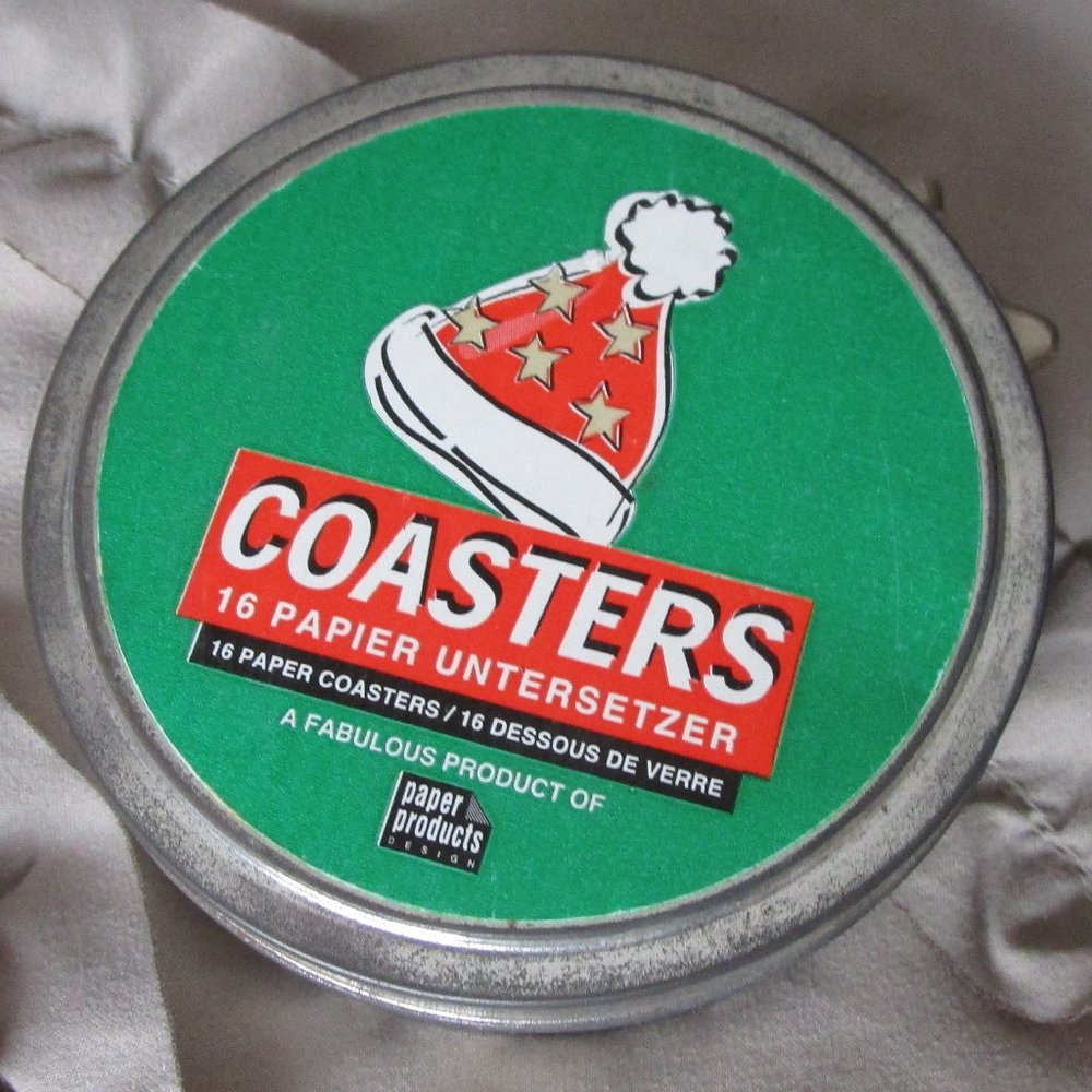 vintage tin of unused paper coasters